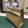 Hermès Kelly 28 sellier veau pellame epsom NUOVA 2026 seriale G color poussier hardware Permabrass full set con scatola Dustbug e scontrini fiscali.