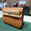 Hermès Kelly Dépêches 25 in Veau Togo colore Gold NUOVA 2026 hardware palladio full set con scontrino ufficiale Hermès