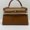 5df1733e-d359-4556-bb3c-0b7790718de2 Hermès mini Kelly Sellier epsom color Gold ( marrone ) NUOVA 2026 Settembre seriale G hardware dorato