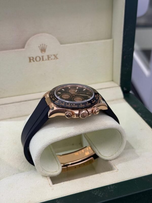 Rolex Daytona oro rosa del 2017 quadrante nero 2 cinturini full set top condition con documenti