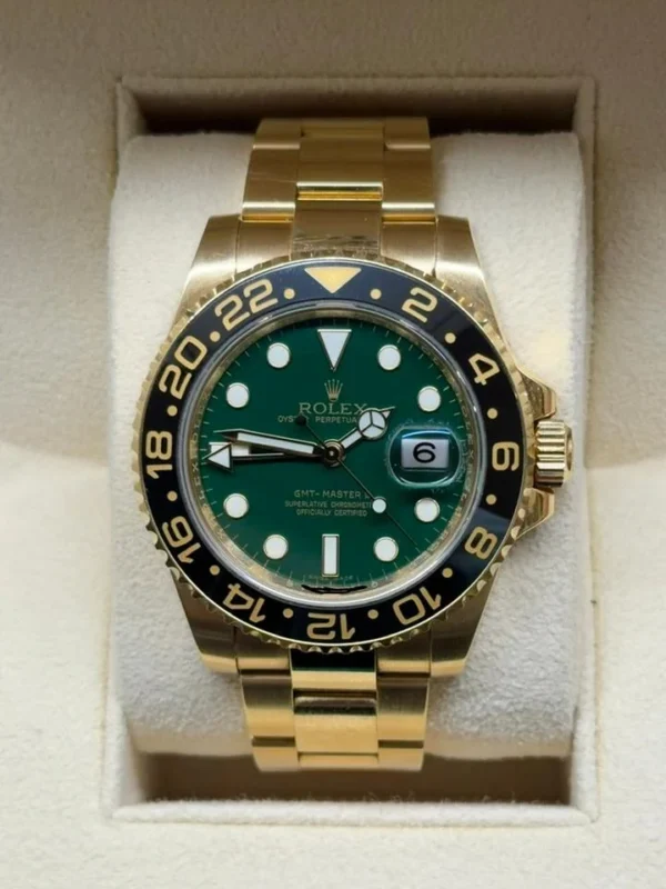 Rolex GMT-Master II GREEN dial del 2011 Italia oro giallo mai lucidato full set excellent condit