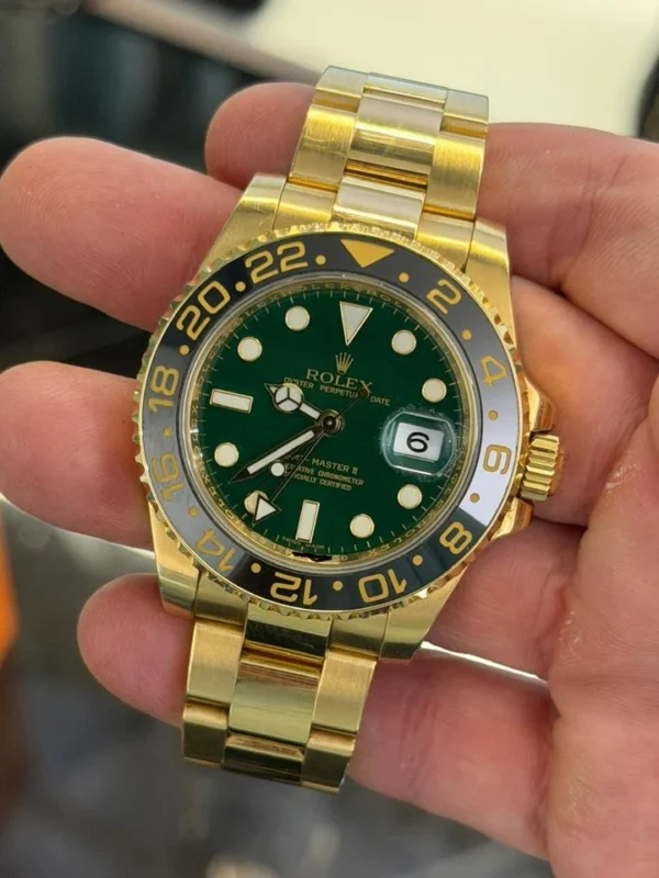 Rolex GMT-Master II GREEN dial del 2011 Italia oro giallo mai lucidato full set excellent condit