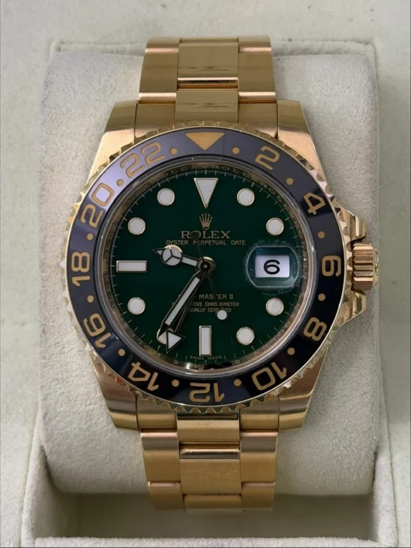 Rolex GMT-Master II GREEN dial del 2011 Italia oro giallo mai lucidato full set excellent condit