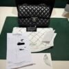 WhatsApp Image 2026-10-04 at 18.32.34 Prezzo di listino Chanel attuale: €10.300 Chanel Classic Double Flap Bag Medium nera