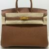 Hermès Birkin 25 retourne veau togo colore gold ( marrone ) stampa G NUOVA 2026