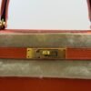Hermès Kelly 28 sellier veau pellame epsom second hand del 2020  seriale D color Orange ( arancio )con hardware dorato parziali pellicole